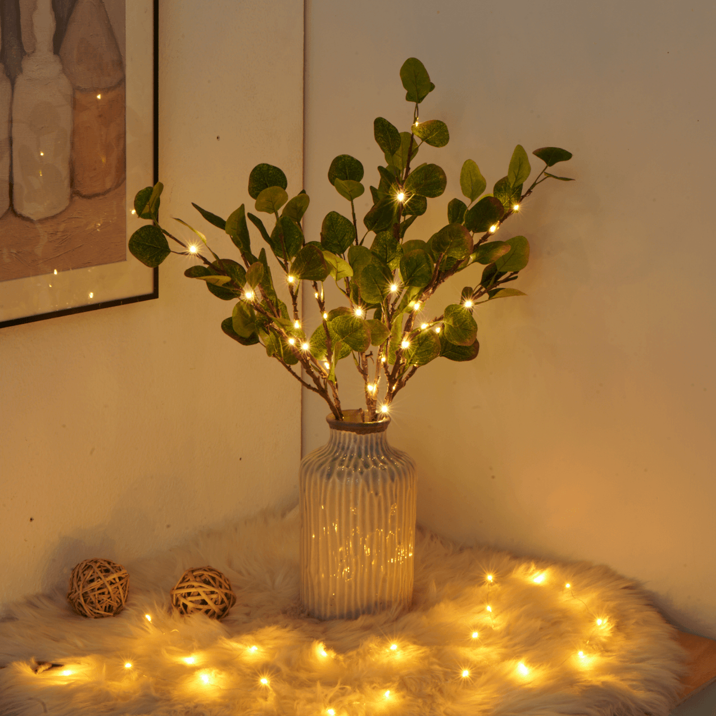 Fairy lights with olive branch for a magical and natural atmosphere