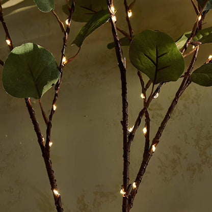 Fairy lights with olive branch for a magical and natural atmosphere
