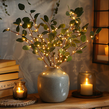 Fairy lights with olive branch for a magical and natural atmosphere